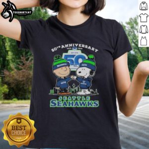 Alt Text: Original Snoopy and Charlie Brown Peanuts Seattle Seahawks 50th Anniversary Ladies Tee, 1976-2025 design.
