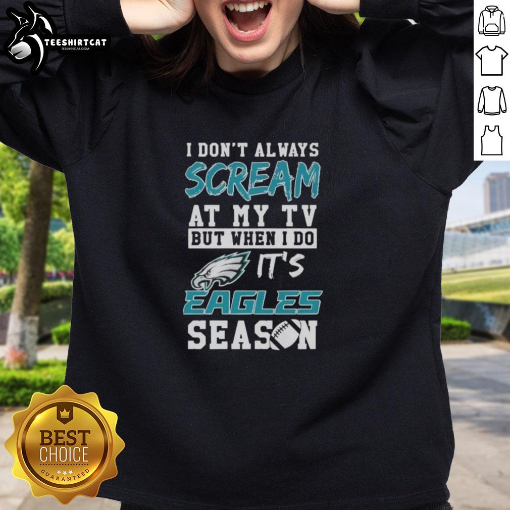 Premium Philadelphia Eagles season sweatshirt with playful slogan about TV reactions, perfect for fans and game day wear.