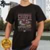 Premium Kansas City Chiefs holiday t-shirt featuring festive graphics and team colors, perfect for celebrating the season.