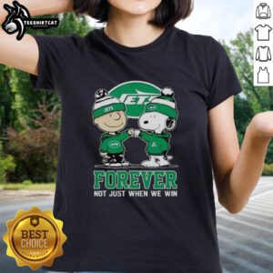 Alt Text: Premium New York Jets Charlie Brown and Snoopy Forever tee for ladies, celebrating team spirit beyond just winning.
