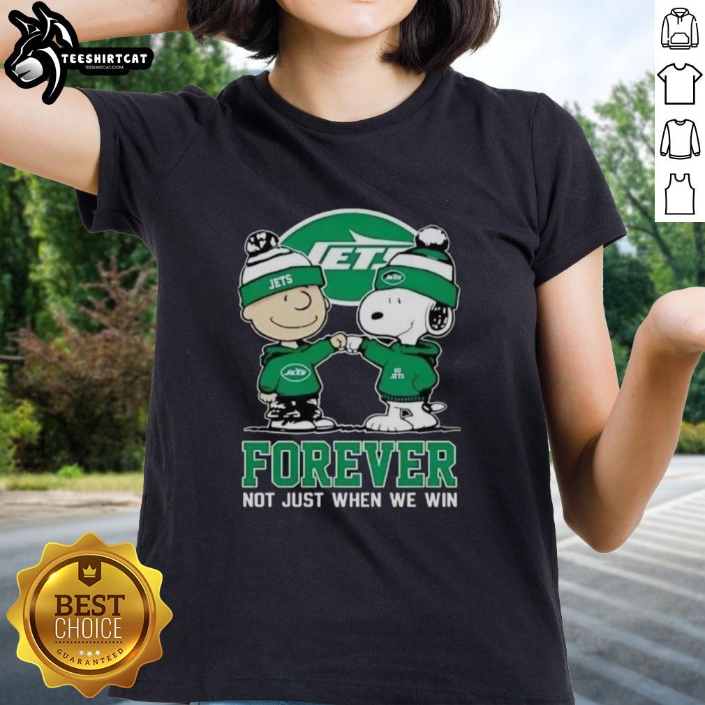 Alt Text: Premium New York Jets Charlie Brown and Snoopy Forever tee for ladies, celebrating team spirit beyond just winning.
