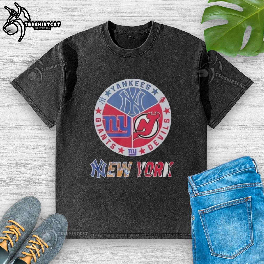 Premium New York Yankees, New York Giants, and New Jersey Devils mashup logo on a washed t-shirt.