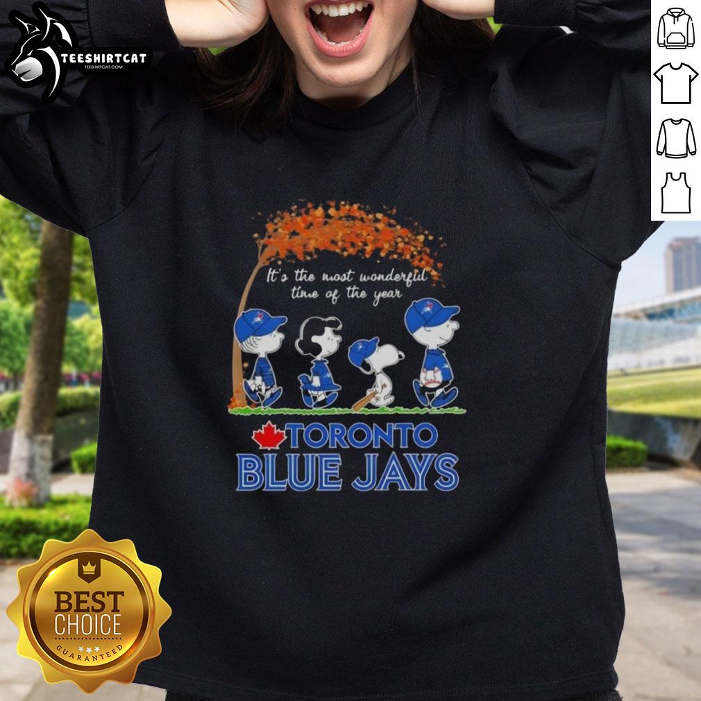 Alt Text: Premium Toronto Blue Jays x Peanuts Snoopy and Friends sweatshirt, perfect for autumn and holiday cheer.
