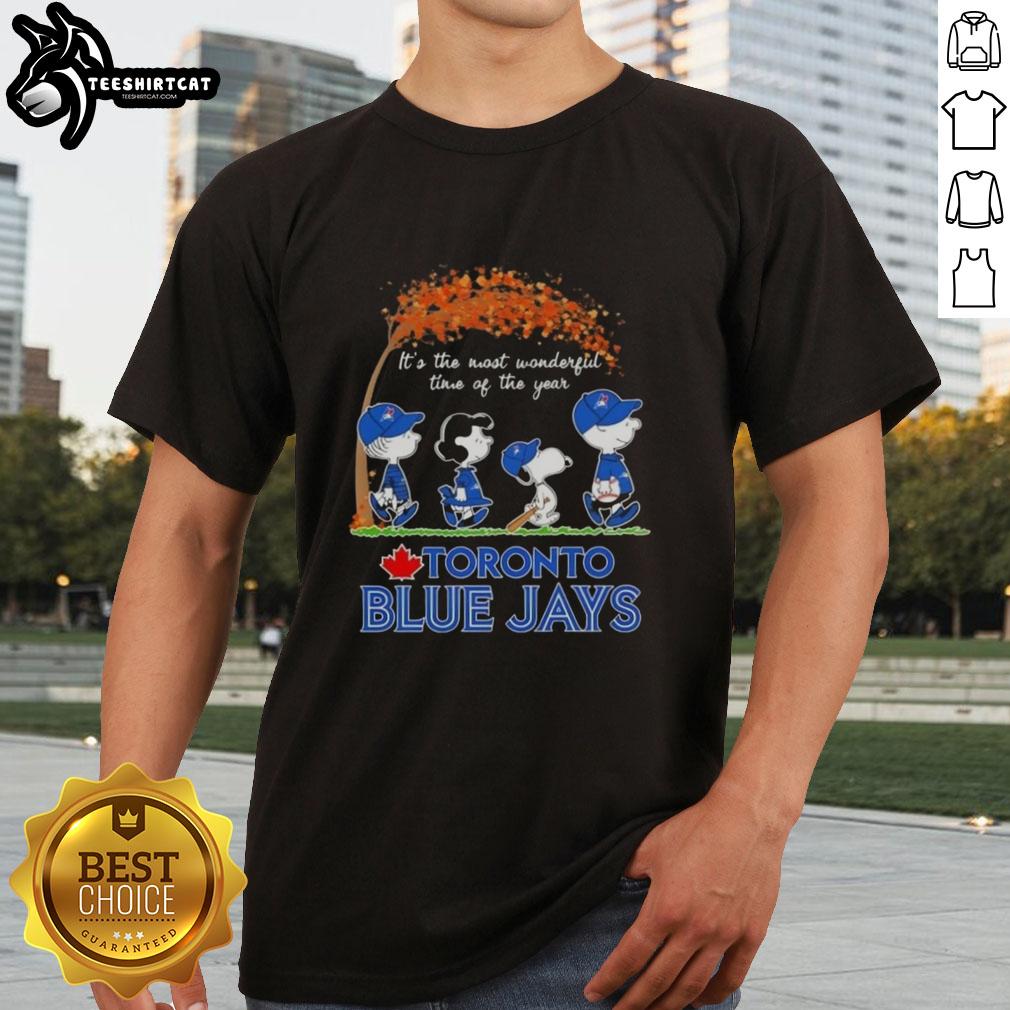 Premium Toronto Blue Jays X Peanuts Snoopy and Friends autumn T-shirt featuring festive design, perfect for fall celebrations.