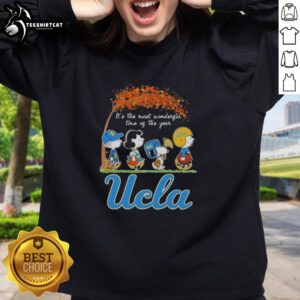 Premium UCLA Bruins x Peanuts Snoopy and Friends autumn sweatshirt celebrating the most wonderful time of the year.