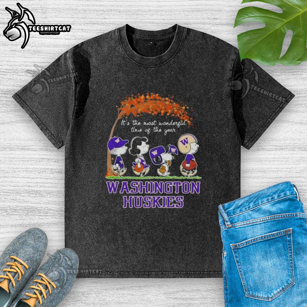 Alt Text: Premium Washington Huskies X Peanuts Snoopy and Friends autumn t-shirt featuring a festive design for the holiday season.