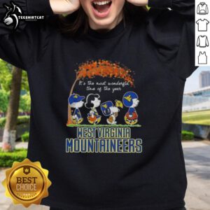 Alt Text: Premium West Virginia Mountaineers X Peanuts Snoopy and Friends sweatshirt for autumn, celebrating the season's joy.