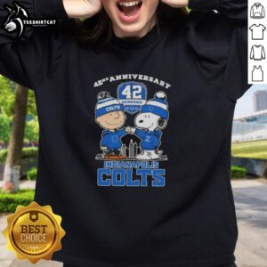 Alt Text: Pretty Charlie Brown and Snoopy 42nd Anniversary Indianapolis Colts football sweatshirt with skyline design.