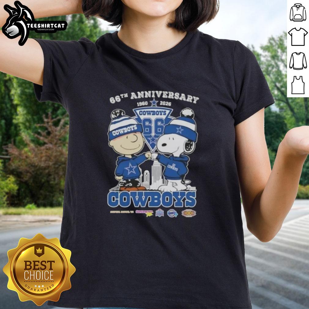 Alt Text: Pretty Charlie Brown and Snoopy 66th Anniversary 1960-2026 Dallas Cowboys Football Skyline Ladies Tee design.