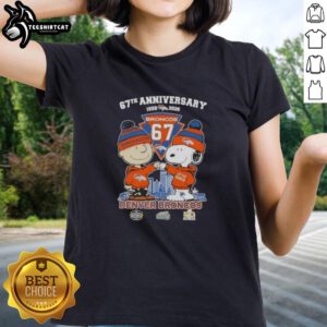 Alt Text: 'Pretty Charlie Brown and Snoopy 67th Anniversary Denver Broncos Football Skyline Ladies Tee design'