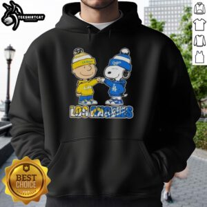 Pretty Charlie Brown fist bump with Snoopy, showcasing Los Angeles Sports Rams x Dodgers hoodie design.