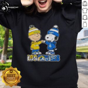 Alt Text: Pretty Charlie Brown fist bump with Snoopy on a Los Angeles Rams x Dodgers sweatshirt, perfect for sports fans.
