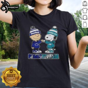 Pretty Charlie Brown fist bump with Snoopy, celebrating Nittany Lions and Philadelphia Eagles on ladies tee.