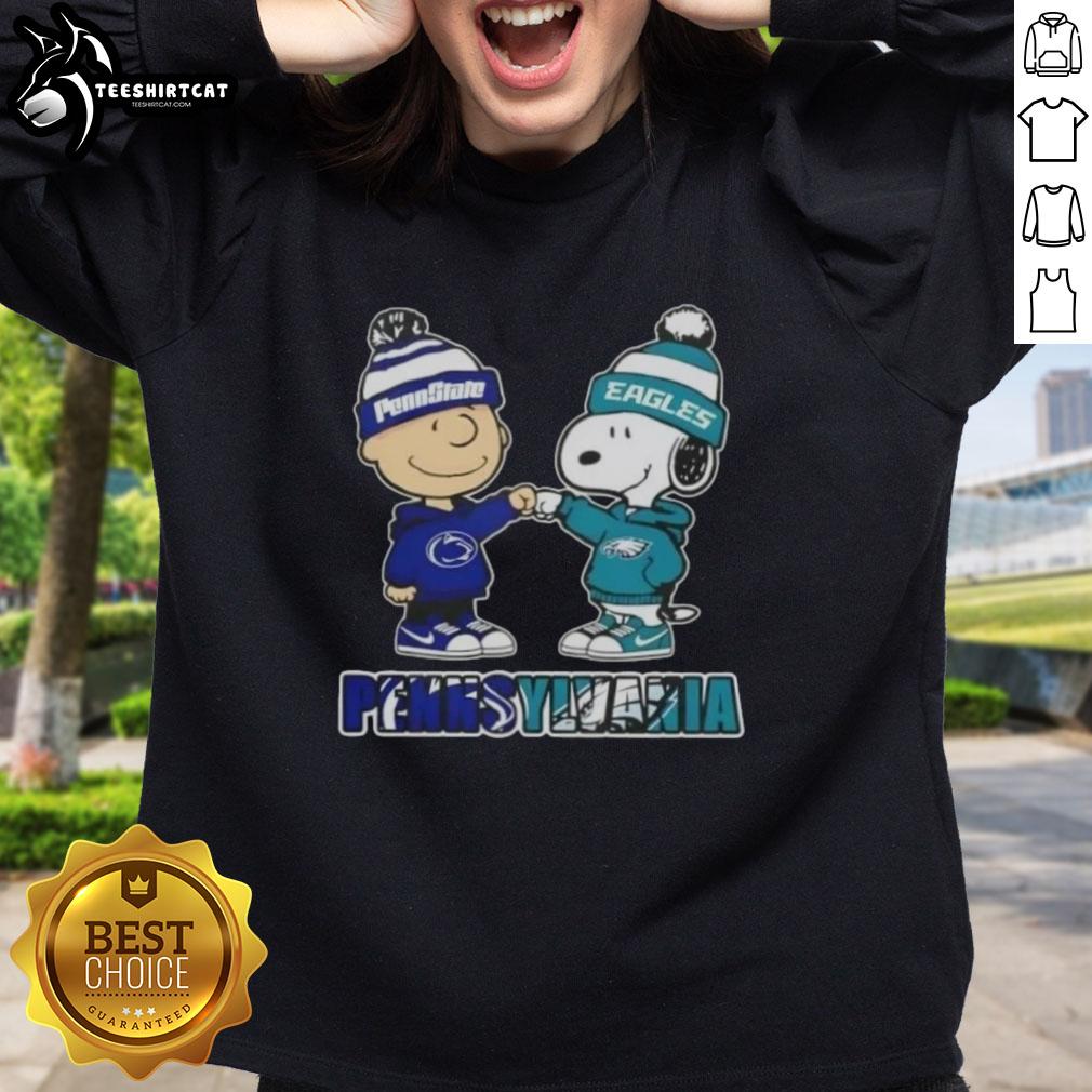 Pretty Charlie Brown fist bump with Snoopy on Nittany Lions and Philadelphia Eagles sweatshirt in Pennsylvania city.