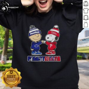 Alt Text: Pretty Charlie Brown fist bump with Snoopy in a Pennsylvania city, featuring Nittany Lions and Philadelphia Phillies sweatshirt.