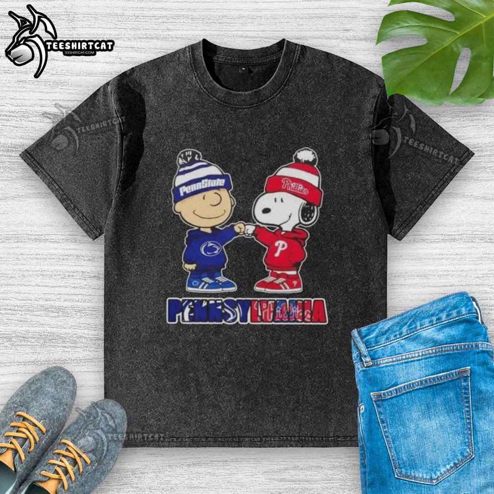 Pretty Charlie Brown fist bump with Snoopy on a Nittany Lions x Philadelphia Phillies washed t-shirt in Pennsylvania.