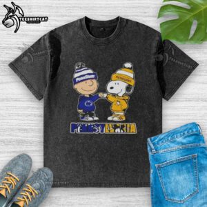 Pretty Charlie Brown fist bump with Snoopy, featuring Nittany Lions and Penguins logos on a washed t-shirt in Pennsylvania.