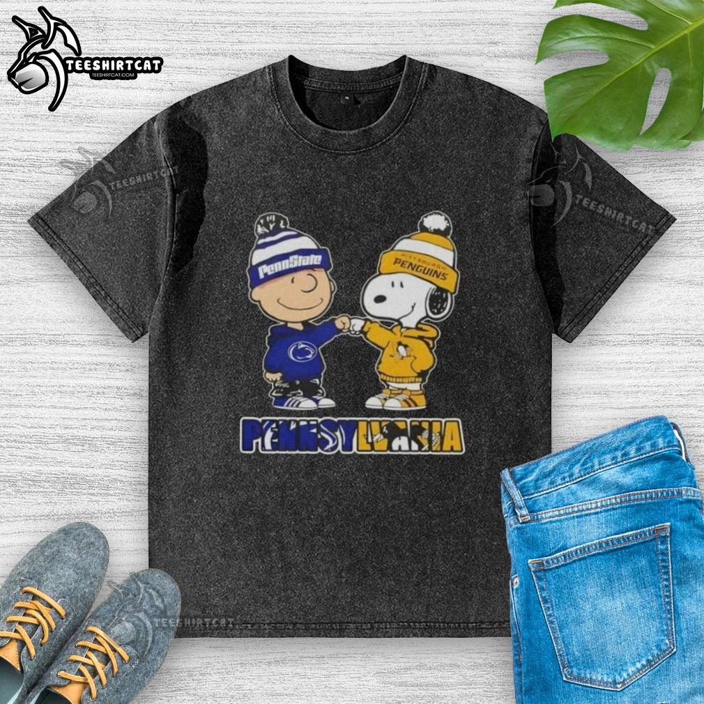 Pretty Charlie Brown fist bump with Snoopy, featuring Nittany Lions and Penguins logos on a washed t-shirt in Pennsylvania.