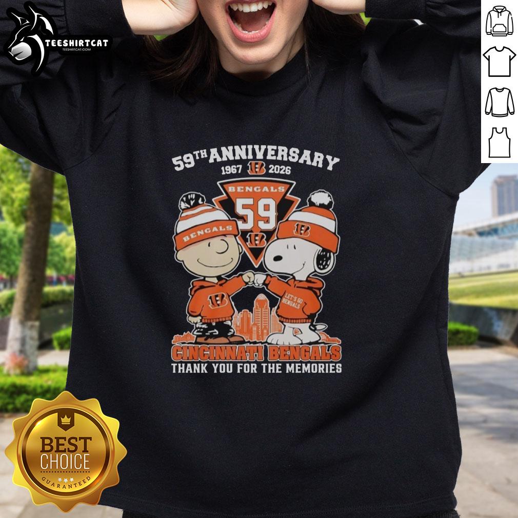 Alt Text: Stylish Cincinnati Bengals outfit featuring Snoopy and Charlie Brown sweatshirt for the 59th anniversary, 1967-2026.
