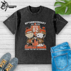 Pretty Cleveland Browns outfit featuring Snoopy and Charlie Brown 82nd Anniversary washed t-shirt, perfect for fans.