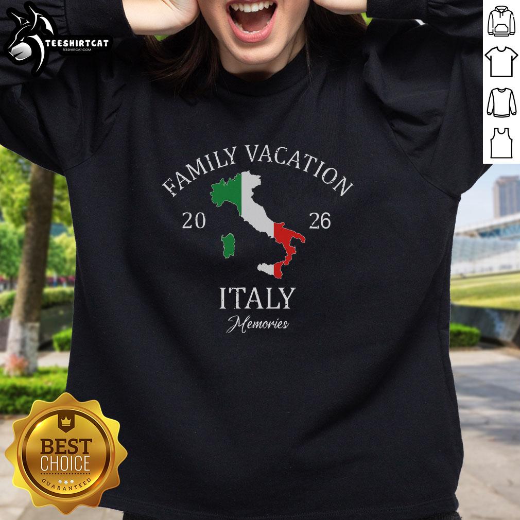 Happy family wearing matching sweatshirts on vacation in Italy 2026, showcasing their Family Travel Squad spirit.