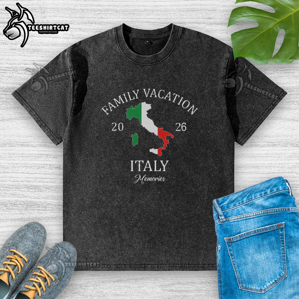 Family enjoying a vacation in Italy 2026, wearing matching washed t-shirts, smiling together in a scenic location.