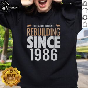 Cozy sweatshirt featuring 'Top Chicago Bears Football Rebuilding Since 1986' design, perfect for fans and casual wear.