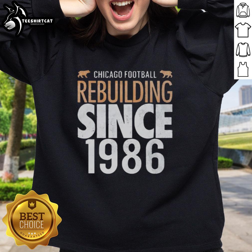 Cozy sweatshirt featuring 'Top Chicago Bears Football Rebuilding Since 1986' design, perfect for fans and casual wear.