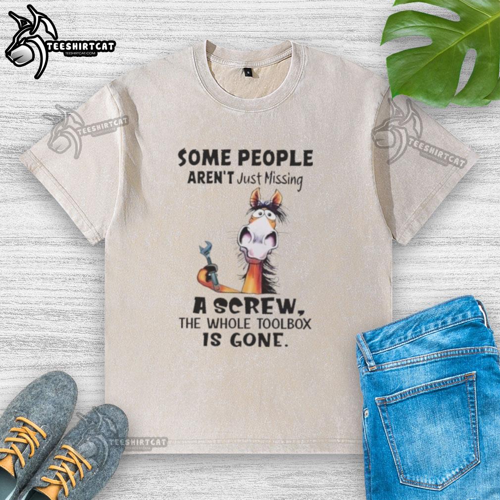 Funny washed t-shirt featuring a horse graphic and the phrase about missing a toolbox, perfect for humor lovers.