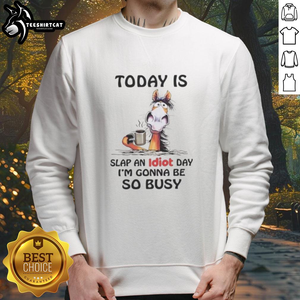 Cozy sweatshirt featuring 'Slap An Idiot Day' design, perfect for horse lovers celebrating humor and fun.