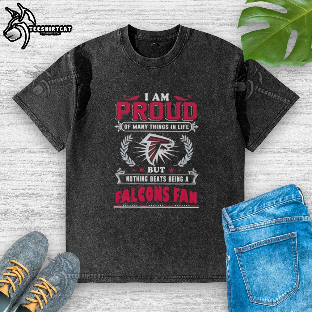 Worn Atlanta Falcons fan t-shirt with the phrase 'I Am Proud Of Many Things In Life' printed on it.