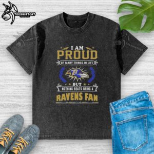 Worn Baltimore Ravens fan T-shirt with the phrase 'I Am Proud Of Many Things In Life But Nothing Beats Being A Ravens Fan'
