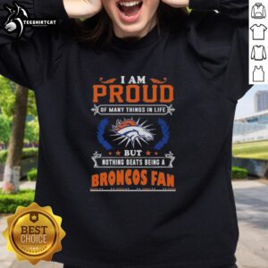 Cozy sweatshirt featuring 'I Am Proud Of Many Things But Nothing Beats Being A Denver Broncos Fan' design.