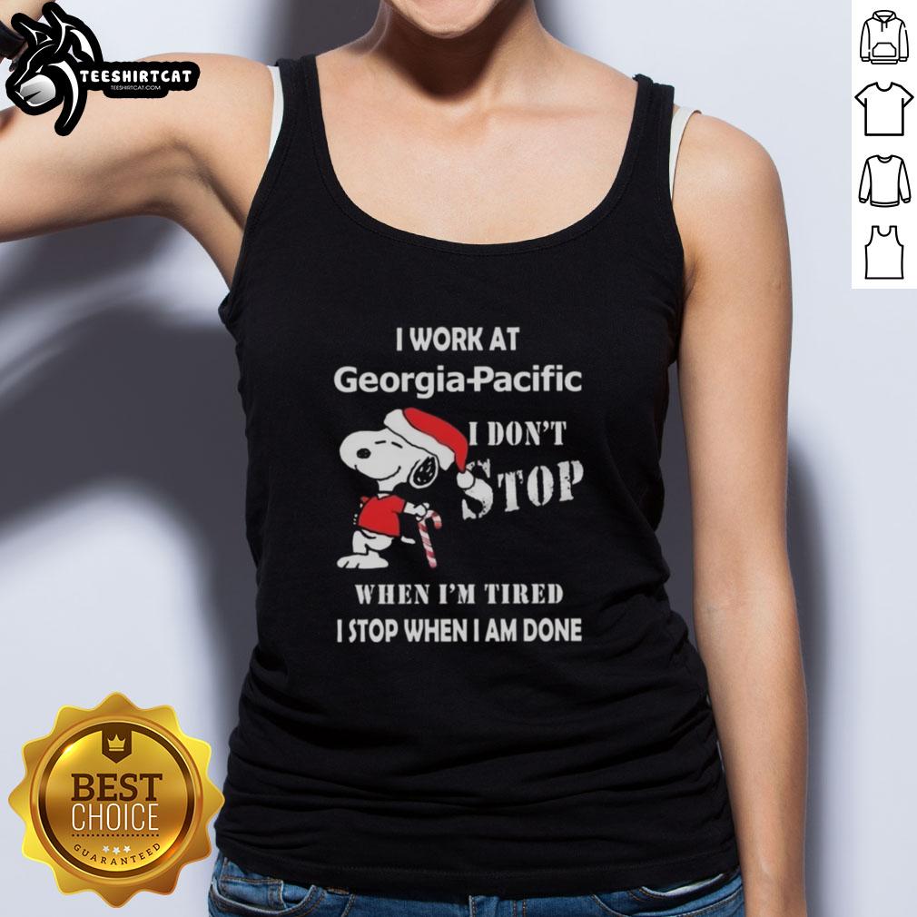 Alt Text: Snoopy Christmas tank top with 'I work at Georgia-Pacific, I don't stop when I'm tired, I stop when I'm done' design.