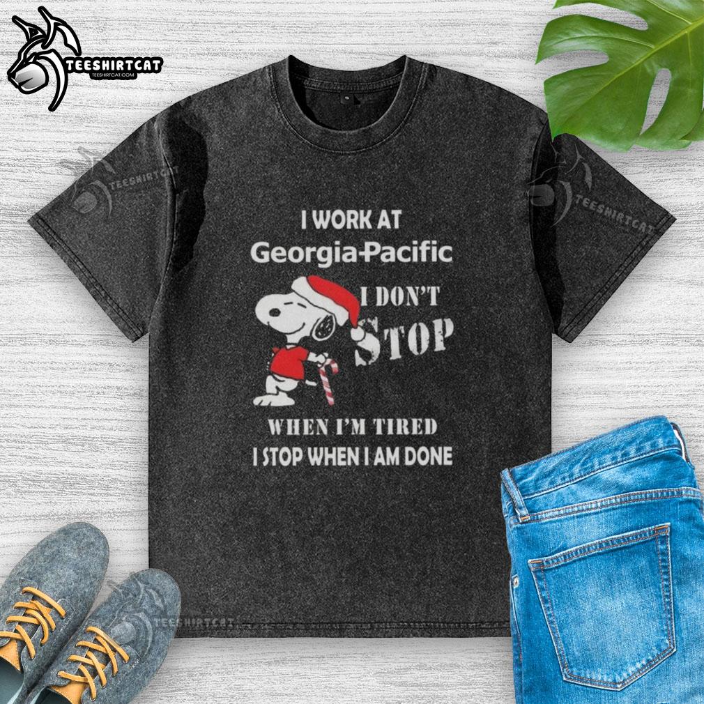 Top Snoopy Christmas T-shirt design: 'I work at Georgia-Pacific, I dont stop when Im tired, I stop when Im done.'