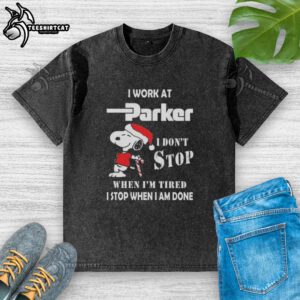 Alt Text: Snoopy Christmas t-shirt featuring 'I work at Parker Hannifin, I dont stop when Im tired, I stop when Im done' design.