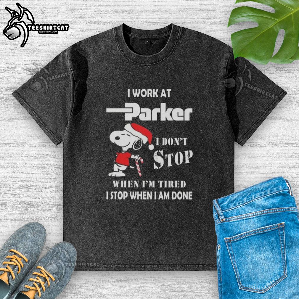 Alt Text: Snoopy Christmas t-shirt featuring 'I work at Parker Hannifin, I dont stop when Im tired, I stop when Im done' design.