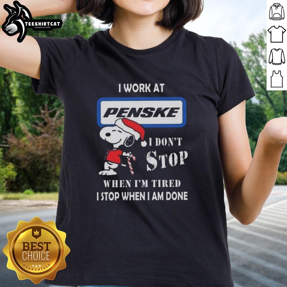 Top Snoopy I Work At Penske Corporation Christmas Ladies Tee featuring Snoopy and motivational text, perfect for holiday gifting.