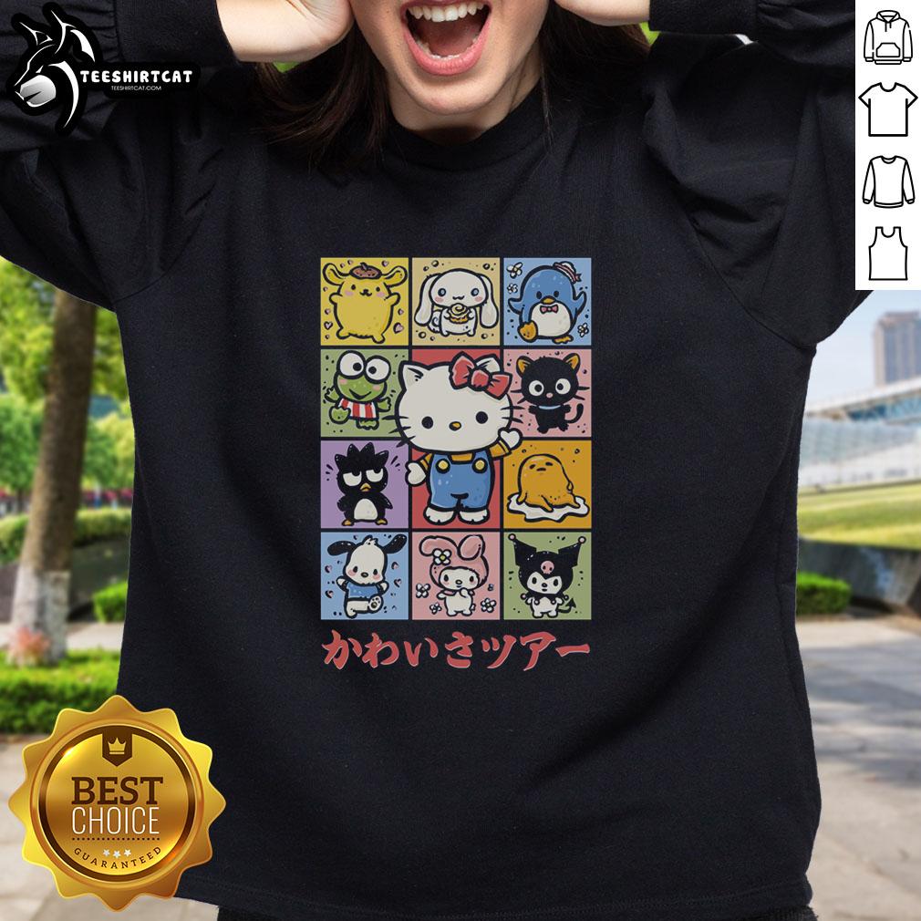 Cozy 'Top The Cuteness Tour' sweatshirt featuring playful graphics, perfect for casual outings and staying stylish.