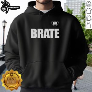 Dejan Milojevic wearing a stylish heart hoodie, showcasing the Awesome DM Brate design in a vibrant setting.