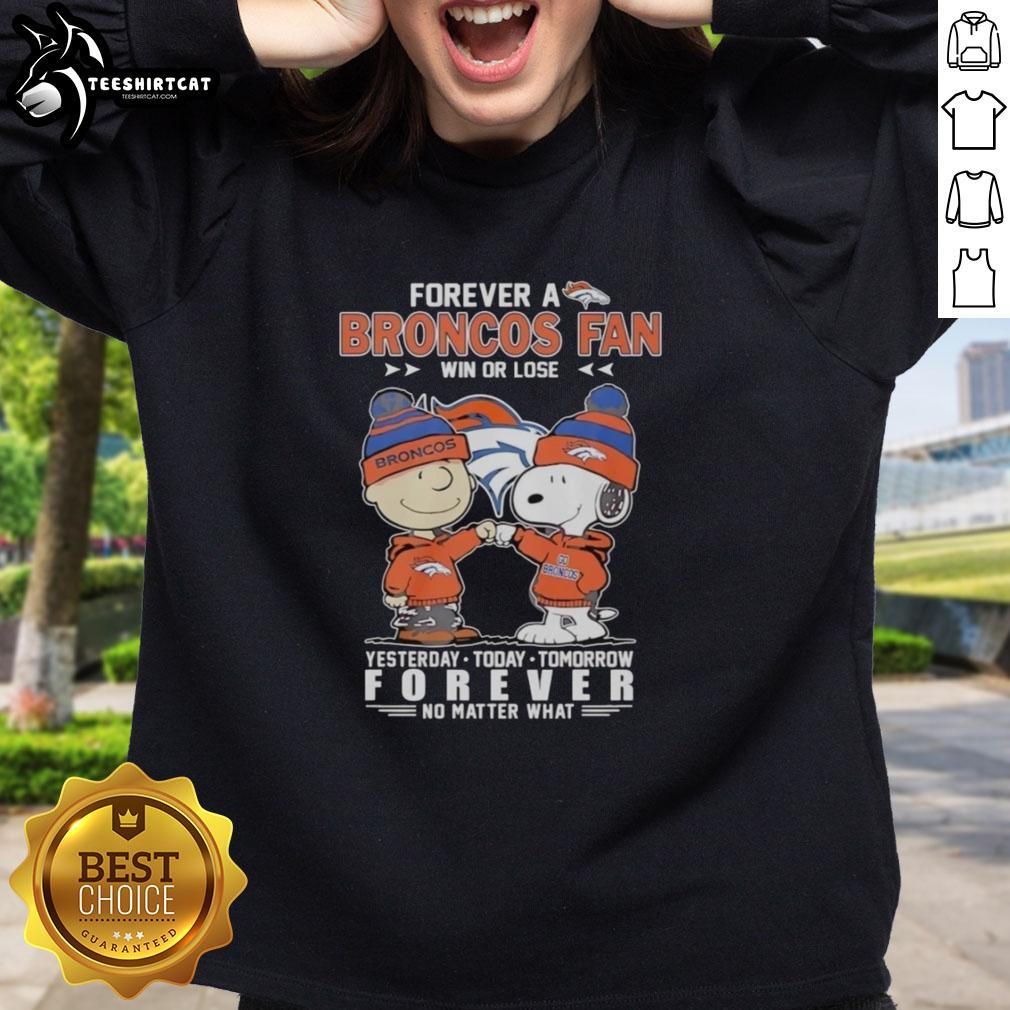 Alt Text: Cute Charlie Brown fist bump with Snoopy, celebrating Denver Broncos fandom in a cozy sweatshirt, win or lose.