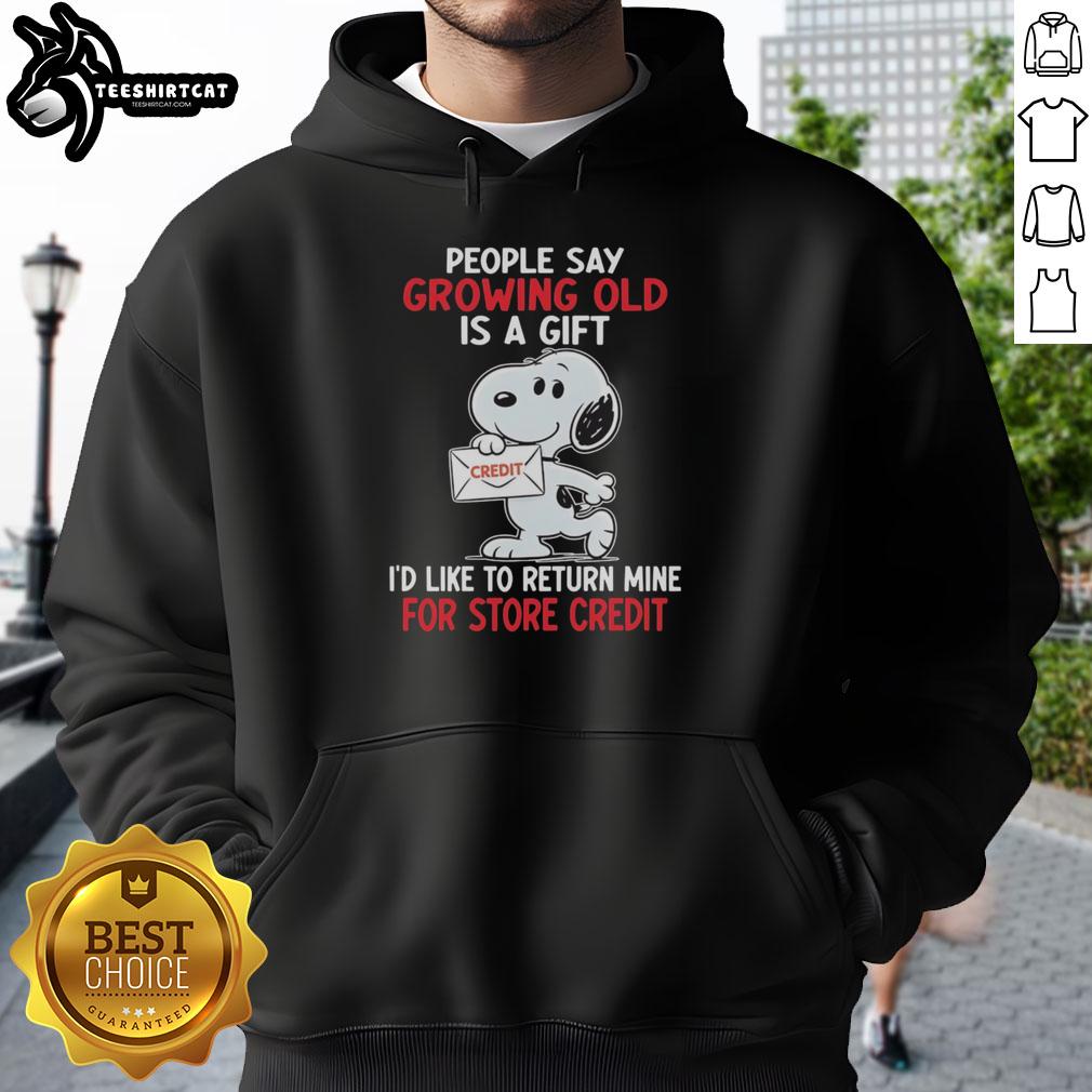 Alt Text: Funny hoodie featuring Snoopy with the quote 'Growing old is a gift, I'd like to return mine for store credit'.
