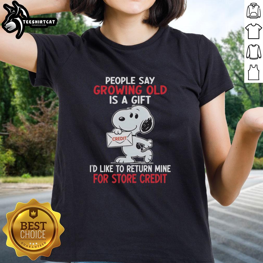 Funny Snoopy graphic tee for ladies with 'Growing old is a gift I'd like to return for store credit' quote.