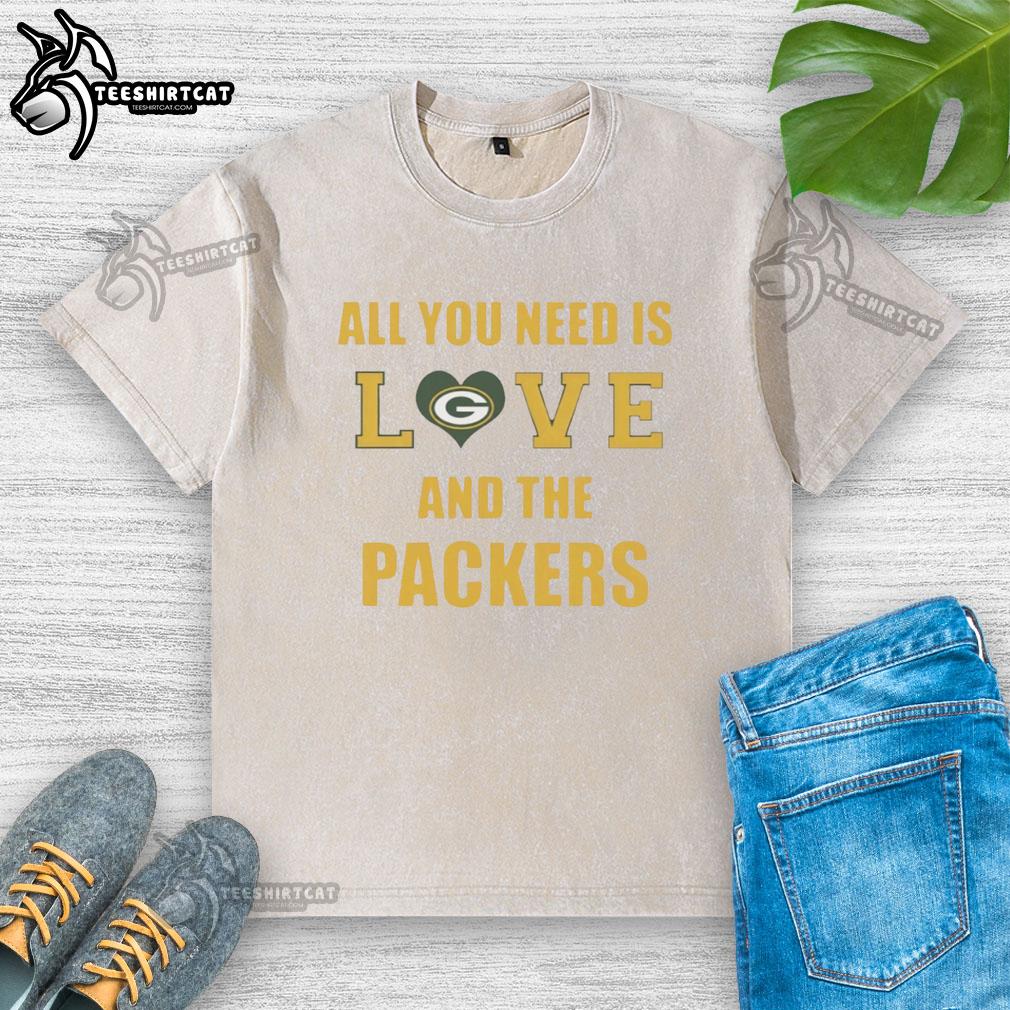 Official All You Need Is Love And The Green Bay Packers washed t-shirt in green, perfect for fans and casual wear.