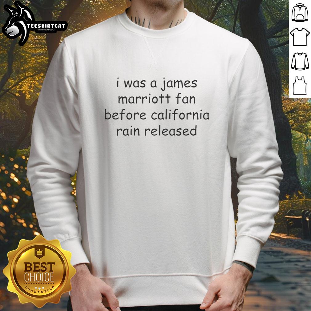 Alt Text: Official 'I Was A James Marriott Fan Before California Rain' sweatshirt featuring stylish design and vibrant colors.
