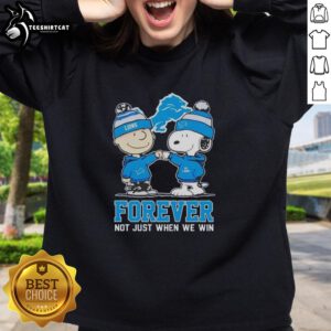 Alt Text: Official Peanut Snoopy Charlie Brown Detroit Lions sweatshirt celebrating team spirit, 'Forever Not Just When We Win.'