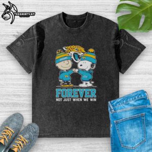 Alt Text: Official Peanut Snoopy Charlie Brown Jacksonville Jaguars Forever T-Shirt in a stylish washed design for fans.