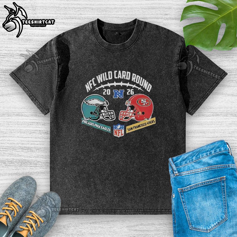 Alt Text: Official Philadelphia Eagles vs San Francisco 49ers 2026 NFC Wild Card Round washed t-shirt displayed on a hanger.