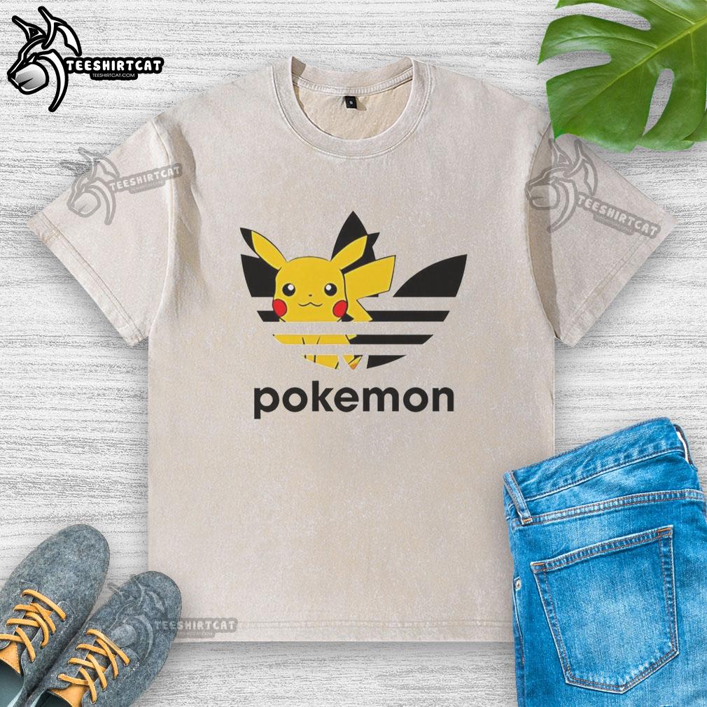 Official Pokemon Anniversary Pikachu Trefoil Parody Logo on a washed t-shirt, showcasing a unique playful design.