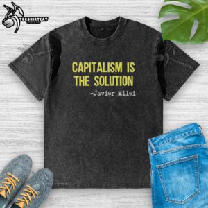 Javier Milei wearing a washed t-shirt with 'Original Capitalism is the Solution' printed, showcasing his economic philosophy.